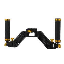 Spring loaded dual handle for gimbals